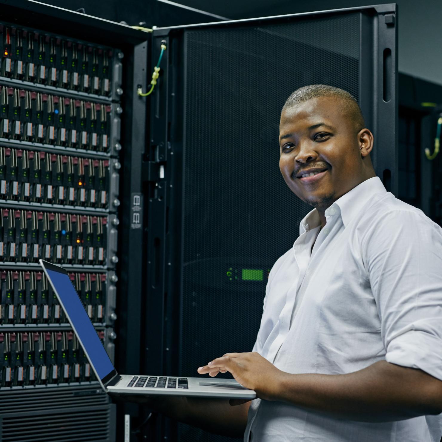 man in data center providing IT network maintenance